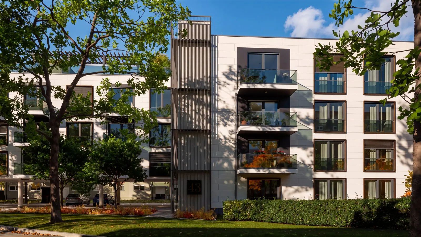 Visualisierung: Ankunft am Tag, Straßenfassade mit Balkonen und Kern