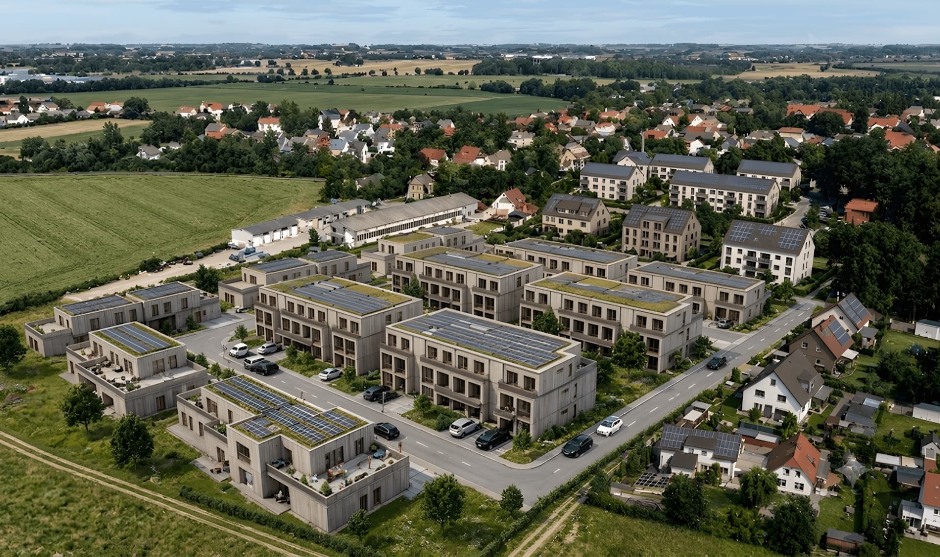 Luxurious arcneo residential development with houses to the left and right of a walkway, in slightly bluish-violet evening light.